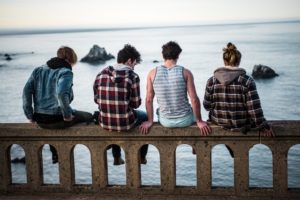 Teens gathering at seaside